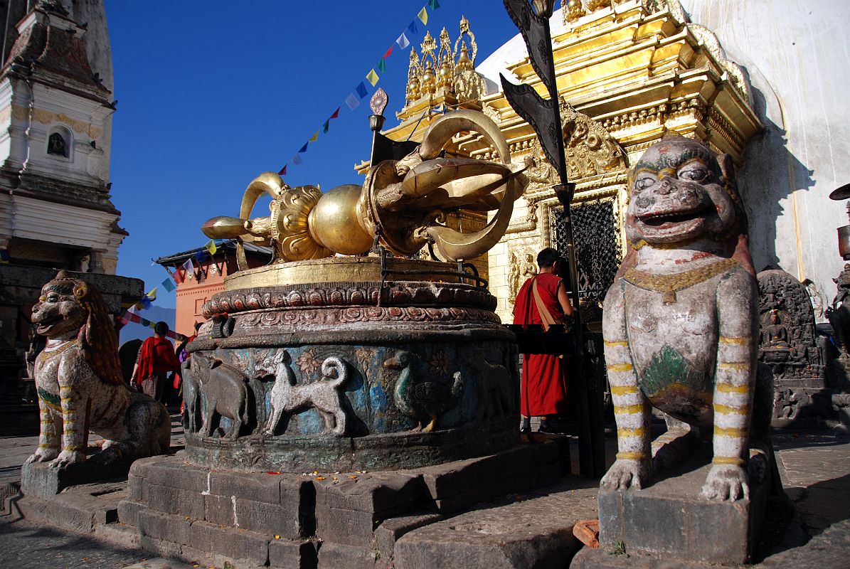 Kathmandu Swayambhunath 14 Two Snow Lions and a Giant Vajra On A Drum With Tibetan Calendar Animals Monkey, Bird, Dog, Pig At Entrance To Swayambhunath Stupa 